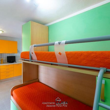 Apartments Casa Vacanze Porto Pino Eksteriør billede
