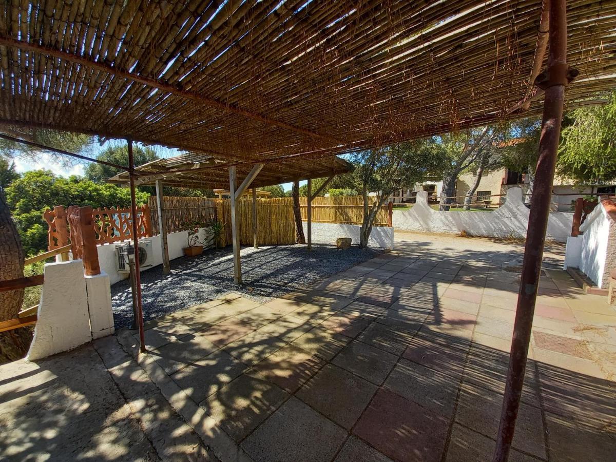Apartments Casa Vacanze Porto Pino Eksteriør billede