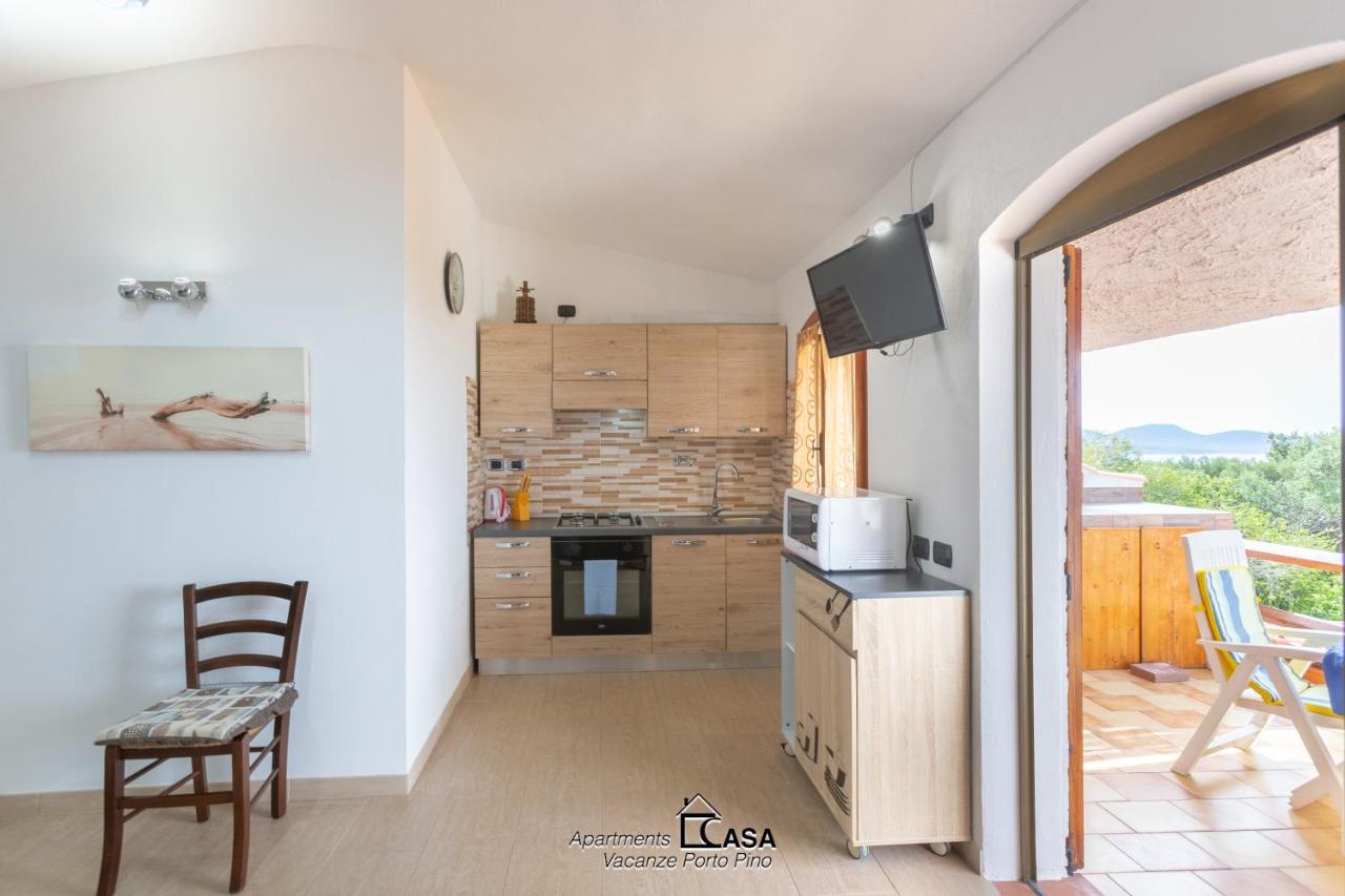 Apartments Casa Vacanze Porto Pino Eksteriør billede