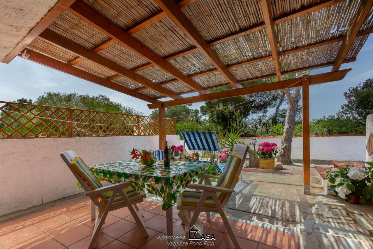 Apartments Casa Vacanze Porto Pino Eksteriør billede