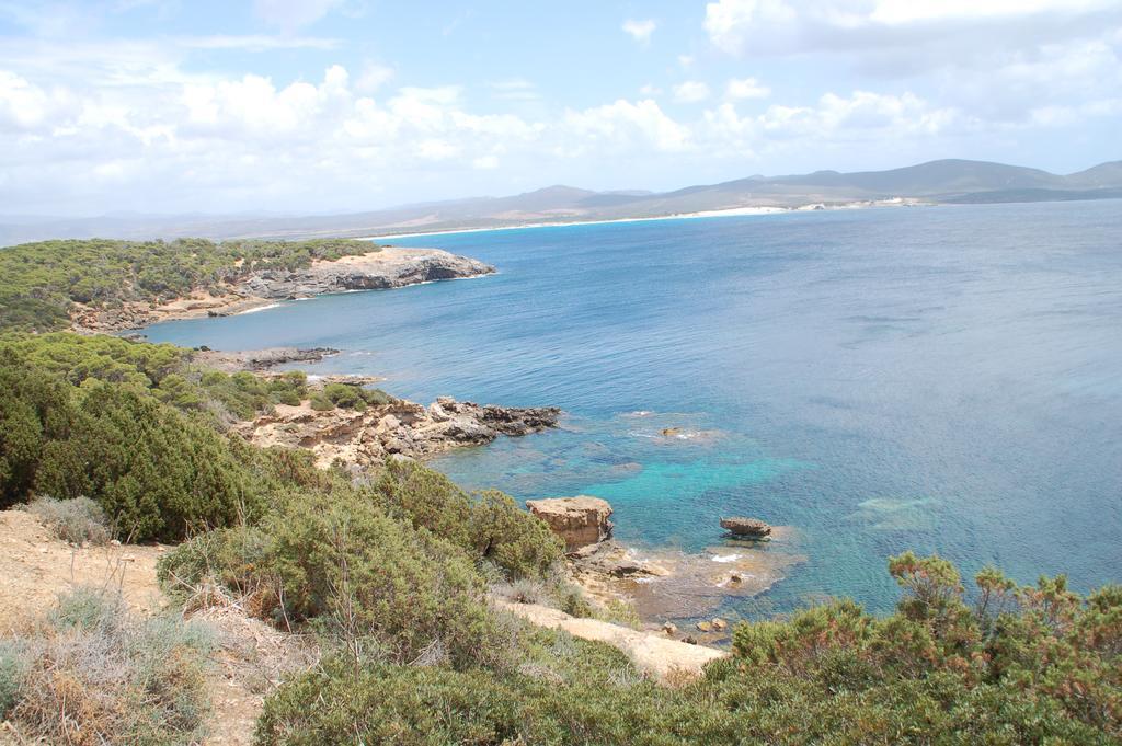 Apartments Casa Vacanze Porto Pino Eksteriør billede