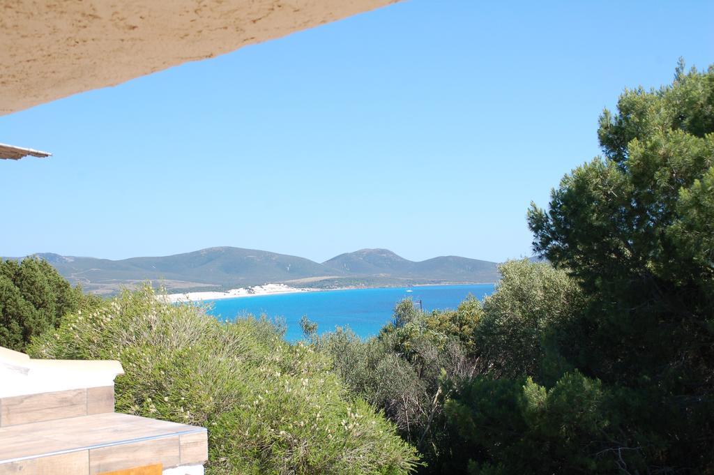 Apartments Casa Vacanze Porto Pino Eksteriør billede